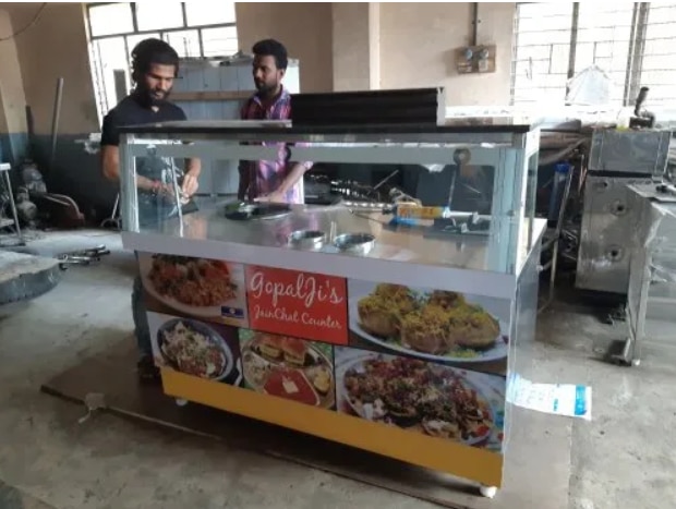 Minimum Order Quantity 3 FeetUsage/Application HotelMaterial Stainless SteelHeight 4-5 FeetSteel Grade SS 304Brand SL Kitchen EquipmentSS CAHTS COUNTER WITH 1 BURNER, WITH TOP GLASS AND GRANITE FRONT STICKER DESIGN.