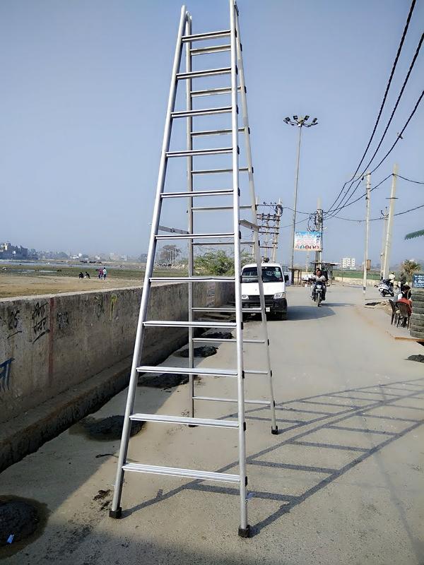 Aluminum auto-folding ladder is a modern, space-efficient access solution designed for convenience, safety, and portability. Engineered with a smart auto-locking and auto-folding mechanism, this ladder allows for quick setup and effortless folding with minimal effort, making it perfect for both residential and professional use.Key Features:High-Grade Aluminum Construction:Lightweight yet strong and rust-resistantIdeal for indoor and outdoor environmentsAuto-Folding Mechanism:Quick-release system enables the ladder to fold or unfold automatically with a simple actionGreat for users who value time-saving and ease of operationCompact Storage:Folds down to a slim profile for easy storage in closets, garages, or vehicle trunksAnti-Slip Steps:Wide, ribbed steps with non-slip surface ensure secure footingStabilizing Feet:Rubberized, anti-skid feet keep the ladder steady on different surfacesLocking Hinges:Automatic locking hinges between segments ensure user safety and structural rigidityAvailable Sizes:Typically available from 4 to 12 stepsExtended height ranges from 1.2 m to 3.8 m depending on the modelIdeal For:Home maintenance and DIY tasksElectrical and plumbing workOffice or light industrial useOutdoor jobs like pruning or paintingALUMINIM AUTO FOLDING LADDER - 10FT