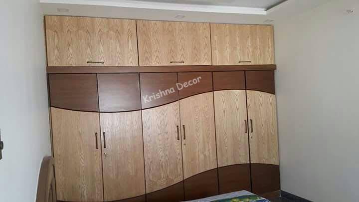 Coimbatore Trendy Bedroom wardrobe Border Doors Krishna Decor are the leading and famous  Bedroom wardrobe Border Doors manufacturers in Coimbatore, Tamilnadu.
