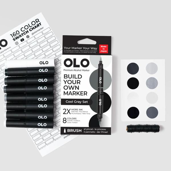 OLO Cool Gray 8pc Brush Set. This curated set offers a complete range of cool gray tones for shading, blending, and creating monochromatic designs. Perfect for adding dimension, depth, and cool-toned highlights to your artwork.Set Includes:8 alcohol-based brush nib markers4 connector ringsA mini blank swatch cardColors in the set: CG0, CG1, CG3, CG5, CG7, CG9, BK Blue Black, ZERO (blender).MADE IN JAPAN