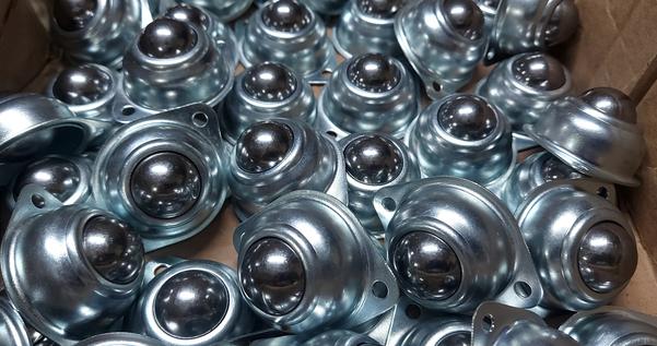 A ball transfer unit (BTU) is a clever little device that makes moving heavy or awkward loads feel like a breeze. It’s essentially a housing with a large ball bearing that sits atop smaller bearings, allowing for 360-degree movement with minimal friction.🛠️ What It’s Used ForBall transfer units are commonly found in:•	Conveyor systems for material handling•	Assembly lines where items need to be rotated or repositioned•	Air cargo terminals for smooth luggage or freight movement•	Machine tables to easily shift components during manufacturing⚙️ Key Features•	Omnidirectional movement: Items glide in any direction•	Mounting options: Surface-mounted, recessed, or spring-loaded•	Material choices: Stainless steel, carbon steel, plastic, or hybrid•	Load capacity: Ranges from light-duty to heavy-duty (up to 8000 kg per unit in some models)