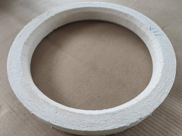 The Ceramic Fiber Refractory Ring is a high-performance thermal insulation component designed for use in extreme heat environments such as furnaces, kilns, and metal processing units. Made from high-purity ceramic fiber, this ring offers exceptional resistance to high temperatures (up to 1260°C), low thermal conductivity, and excellent resistance to thermal shock and chemical attack.Commonly used as a sealing or insulating element in rotary kilns, heat treatment chambers, and molten metal systems, the refractory ring ensures stable operation, energy efficiency, and protection of surrounding components. Its lightweight and durable construction makes it easy to handle and install.✅ Key Features:High temperature resistanceExcellent thermal insulationWithstands thermal shock and corrosionLightweight and strongCustom sizes and shapes availableIdeal for industrial and foundry applications