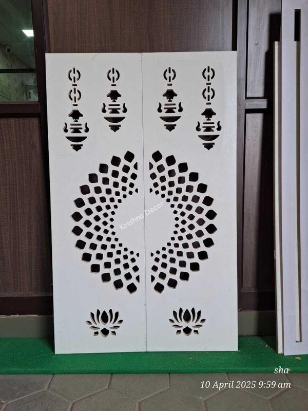 Coimbatore CNC Pooja Door Chakra Design With Lamp Krishna Decor are the No.1 Interior Job work Company in Coimbatore.We take all kind of interior job work at best price in market.