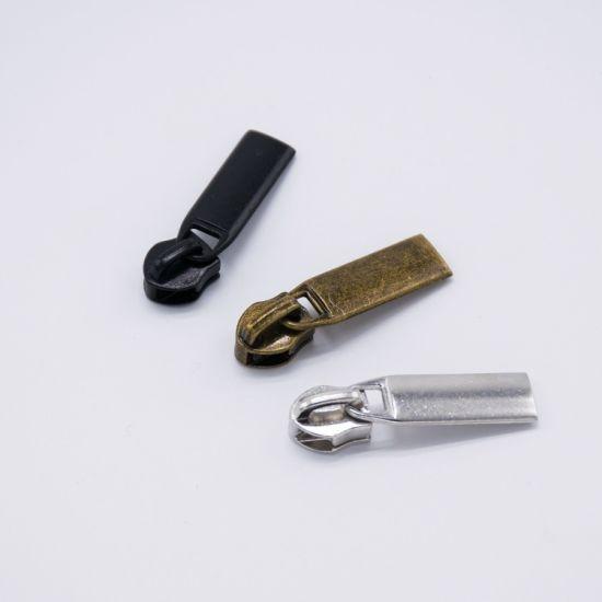 This is 5 no CFC fancy design slider.This product is mainly used in export item.made of durable metal alloys, zinc alloy, and feature finishes like electroplating for aesthetics and wear resistance. Custom metal zipper puller outlook design professional suggestionAccept custom brand logo onlyOver 500+ existing metal hook mold selectionDifferent designs reference,strong plating surface.THIS PRODUCT IS MANUFACTURED & MARKETED BY ZA MULTITECH INDIA BAG MATERIALS PVT LTD
