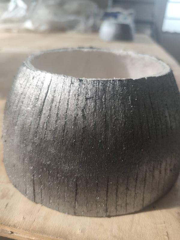 This Graphite-Coated Ceramic Fiber Gasket is a premium, high-temperature sealing product designed for industrial furnaces, kilns, and aluminium casting operations. It is made from high-purity ceramic fiber and coated with graphite, offering superior thermal resistance, gas sealing, and surface protection in harsh environments.With a temperature resistance up to 1260°C, it ensures reliable performance under extreme conditions while reducing energy loss and equipment wear.🏭 Kumaran Shapes and Gasket is currently the only manufacturer in India producing this specific custom size with graphite coating—setting a new standard in refractory sealing solutions for demanding industrial applications.✅ Key Highlights:High-temperature resistance with graphite surface layerCustom size – exclusive to Kumaran Shapes and GasketExcellent sealing, gas resistance, and surface durabilityLightweight, flexible, and easy to installIdeal for aluminium industry, furnaces, and molten metal systems