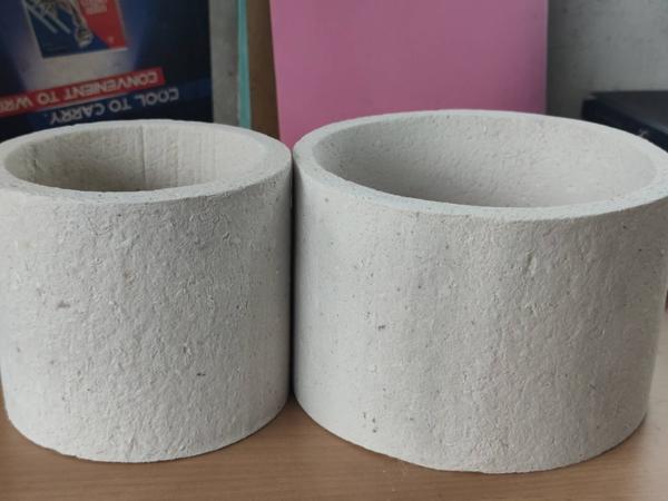This Ceramic Fiber Refractory Cylinder is a high-performance, pre-formed insulation product designed to withstand extreme temperatures up to 1260°C. Manufactured from high-purity ceramic fiber, it offers excellent thermal insulation, lightweight strength, and resistance to thermal shock.Ideal for use in furnaces, kilns, and aluminium casting systems, these hollow cylinders serve as thermal sleeves, protection covers, or flow control components. Their pre-formed cylindrical shape ensures easy installation, minimal heat loss, and extended equipment life.📌 Custom sizes are available, and Kumaran Shapes and Gasket is proud to be among the few offering such specialized refractory shapes in India.✅ Key Features:Withstands temperatures up to 1260°CHigh thermal insulation with low heat storageExcellent resistance to flame and thermal shockLightweight, durable, and easy to installUsed in aluminium, furnace, and casting applications