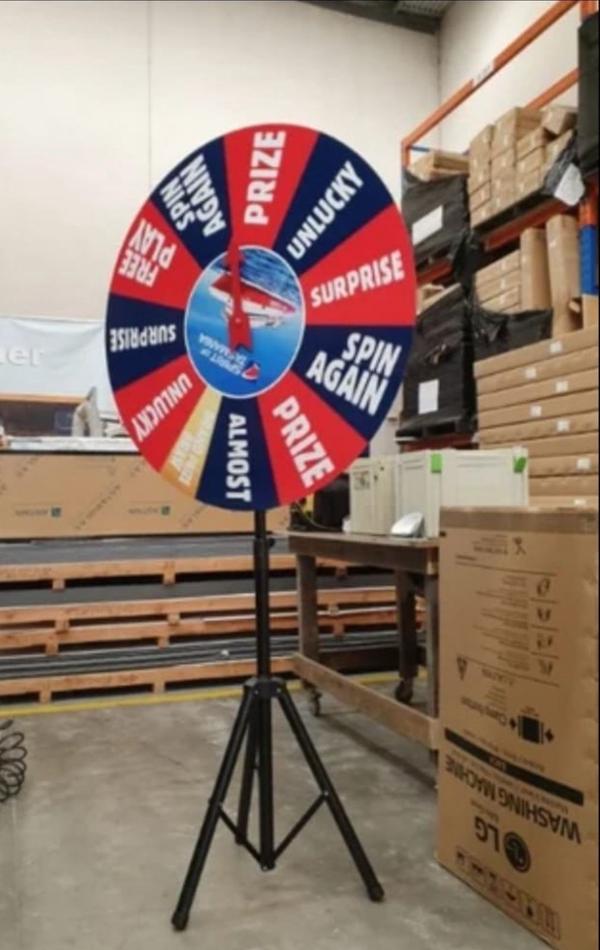 Wheel Size -2 feet Spin Wheel with 4mm Plywood Stand Size - 5 feet Metal Stand Powder Coated with Accessories Purpose - Branding, Advertisement and Customer Engagement Program