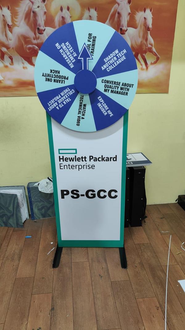Product- Branding Spin WheelMaterial -Plywood,Metal Stand,Sun Pack Board and Acrylic Sticker Purpose -Customer Engagement Program