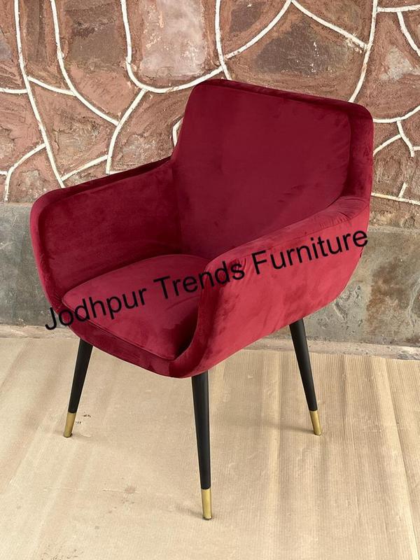 Modern teak frame with velvet upholstery, armrests, and stainless. Common pairings include solid wood frames (Sheesham or engineered wood), metal legs, and fabric cushions in neutral tones like cream, grey, or muted pastels .