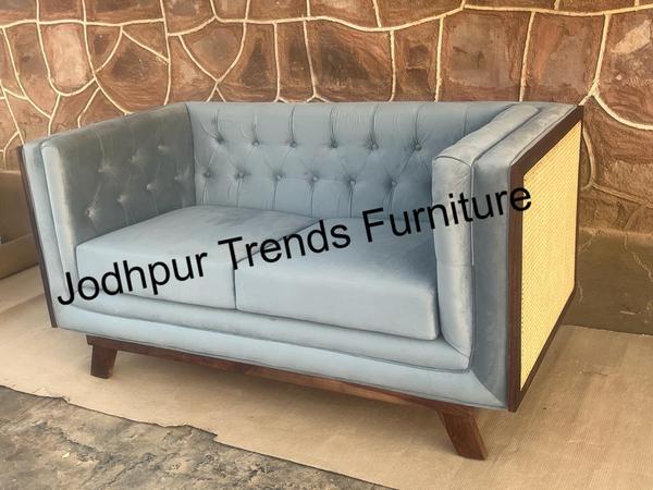 Bring timeless sophistication into your living space with this beautifully hand-crafted two-seater sofa, featuring a tufted button design that exudes vintage charm. Ideal for small living rooms, cozy nooks, or elegant entryways, this piece offers both style and comfort in a compact footprint.Hand-Crafted Frame: Built by skilled artisans for lasting durability and unique character.Deep Button Tufting: Classic diamond-pattern tufting enhances the vintage appeal and provides structured support.Premium Upholstery: Soft, durable fabric or leather options (customizable) in a range of classic or contemporary colors.