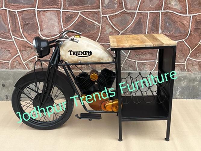 This trend is both functional and sustainable—these pieces upcycle discarded automotive parts into durable, conversation-starting furniture. They're crafted with care, combining reclaimed iron and wood to create a rustic-industrial appeal that fits well in restaurants, lounges, or theme-centric interiors . jodhpur trends.com