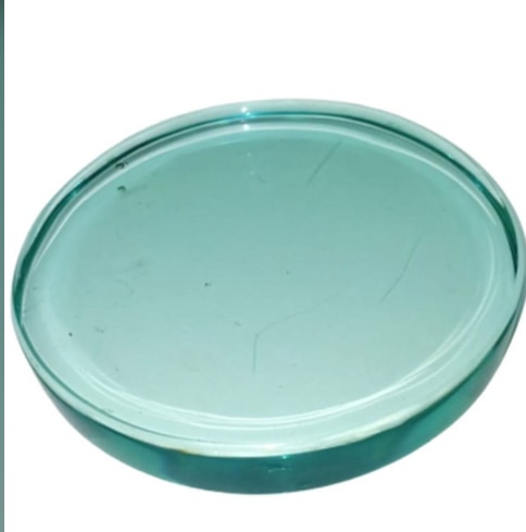 This is a toughened round Glass use in boiler tank .In toughened glass we can customise all sizes from 15mmdia to  300 mm Dia and the thickness is up to 3 mm to25mm. 