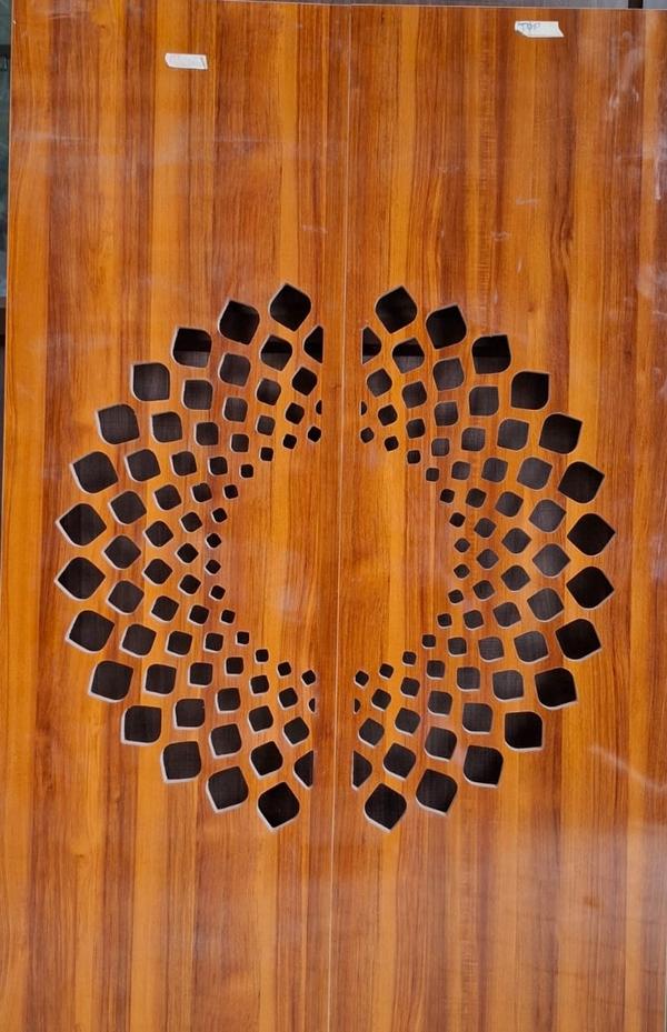 Coimbatore Pooja room 2D CNC doors are custom-designed doors and wall design 2d design .