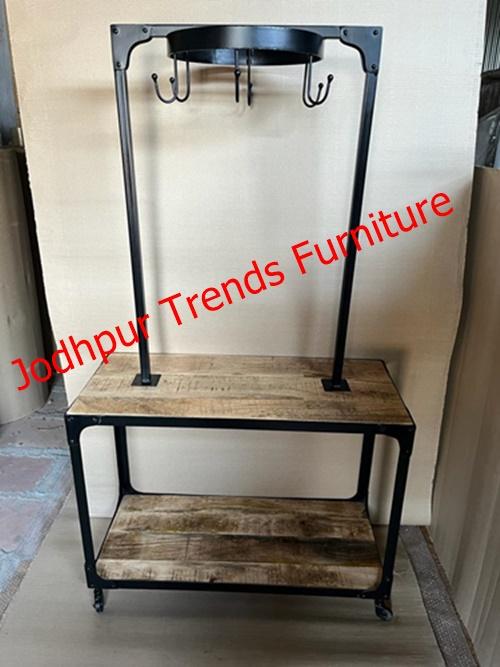 A versatile 4‑tier stainless steel drying rack with foldable wings and caster wheels for easy mobility Capable of holding laundry items such as towels, clothes, shoes, or even quilts — up to 20 pieces on some variants Durable build using heavy‑duty stainless Wooden and Metal equipped with reinforced double rods for enhanced stability..
