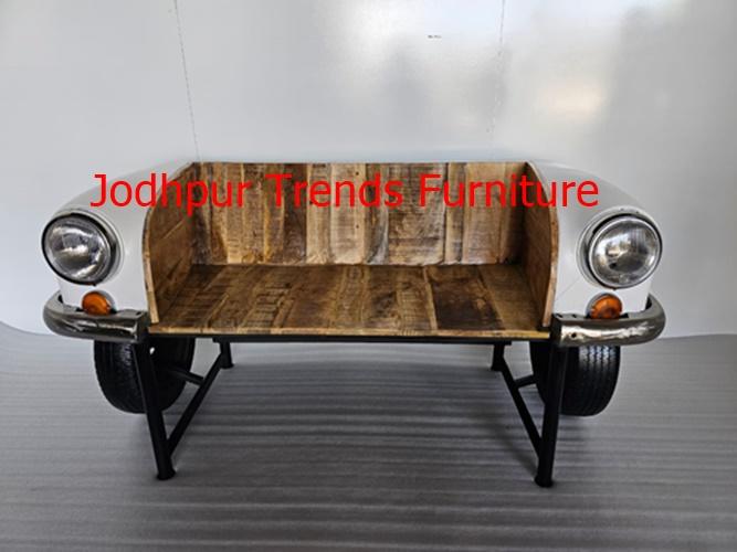 These sofas mimic the front-end silhouette of the vintage Ambassador car, featuring Metal or Wooden upholstery, metal accents, and even functioning headlights or wheels—all crafted for a bold, industrial-chic look. Many are produced by Jodhpur-based manufacturers.Jodhpur Trends is a major player based in Jodhpur that specializes in industrial, vintage, reclaimed, and automobile furniture, serving both domestic and international markets Jodhpur Trends .Com