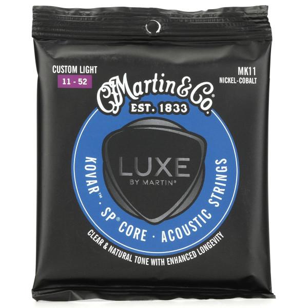 Martin MK11 Luxe Kovar Acoustic Guitar StringsLUXE BY MARTIN® Kovar™ SP Core Strings are where innovation and performance meet, for the player who knows exactly what they want from their acoustic guitar strings. Crafted with our high-tensile Superior Performance SP® core wrapped in Kovar, a nickel-cobalt alloy, these strings are all about delivering crystal-clear clarity and a tone so balanced it'll make your heart sing. These strings aren't just for show. They're made for the player who demands precision and power in equal measure. That's why we've engineered them with lower tension, not as a compromise, but as a conscious choice to enhance your technical prowess. So go ahead, dig in deep - these strings can take it. And durability? Kovar strings feature natural corrosion resistance, meaning these strings will be with you for the long haul, sounding as sweet as the day you strung them up. Ready to take your playing to the next level? When it comes to the art of crafting acoustic guitar strings, we don't just meet standards - we set them.Custom Light .011 .015 .023 .032 .042 .052 150.60 MK11