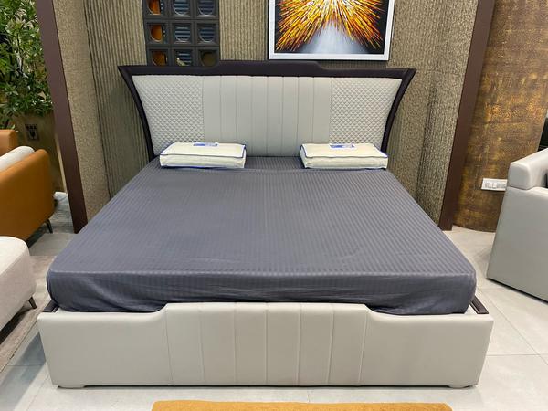 This imported king size bed showcases premium craftsmanship and timeless elegance. Made from high-quality materials, it offers exceptional durability and comfort. Its spacious design provides the perfect blend of style and relaxation, while the refined finish complements both modern and classic interiors. A true statement piece, it transforms your bedroom into a luxurious retreat, ensuring restful nights and adding a touch of sophistication to your living space.
