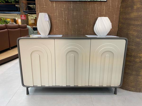 This premium imported console combines elegance with practicality. Designed with a sleek profile and crafted from high-quality materials, it features ample storage space and a refined finish. Perfect for enhancing entryways, living rooms, or dining areas, it adds a sophisticated touch to any home. The versatile design ensures it fits seamlessly into various décor themes, while its timeless aesthetic makes it a lasting and functional style statement.