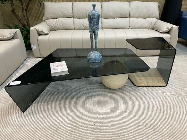 This exquisite center table combines luxury and modern craftsmanship with its striking design. Featuring a 12MM grey glass top, it offers a sleek and sophisticated surface that beautifully complements the sturdy base. The round natural marble base in Italy White Cave finish adds timeless elegance and strength, making it a true statement piece. Perfectly blending durability with style, this imported table is ideal for elevating any living room with a touch of refined sophistication.
