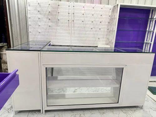 Retail Shop Display Rack a Sole Proprietorship Firm based firm engaged as the foremost Manufacturer Trader And Service Provider of Mild Steel Gate Parking Shed Medicine Rack and many more We also provide Parking Shed Fabrication Service Glass Glazing Service Gypsum False Ceiling Design Service Shed Fabrication Service CNC Laser Cutting Service