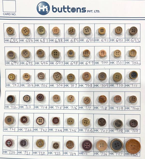 Wooden effect buttons are stylish, durable, and versatile fasteners that add a natural, rustic charm to shirts, jackets, and casual wear. While some are crafted from real wood, others are made from polyester or resin with a realistic wooden texture — offering the same natural look with enhanced strength and wash ability.Types of Wooden Effect ButtonsReal Wooden Buttons – Made from eco-friendly woods (such as teak, bamboo, or maple).Coconut Shell Buttons – Natural and rustic, popular for casual shirts, kurtas, and eco-fashion.Resin / Polyester Wooden Effect Buttons – Mimic wood grains and colors but are more durable and washable, perfect for mass production.Engraved Wooden Buttons – Custom designs, logos, or patterns etched into the surface.Features & Benefits✔ Natural Look – Adds an earthy, organic feel to garments.✔ Lightweight – Comfortable and practical for casual wear.✔ Durable – Resistant to washing and everyday wear (especially resin wood-effect).✔ Customizable – Available in multiple sizes, shapes, colors, and logo engravings.✔ Eco-Friendly Options – Real wood and coconut shell buttons are biodegradable.
