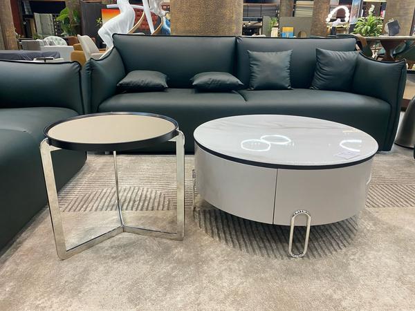 This imported center table is a luxurious addition to any living space, offering a unique design that blends elegance with modernity. Crafted with premium quality materials, it features a fine finish and intricate detailing that makes it stand out as a centerpiece. Its durable construction ensures long-lasting use while adding sophistication to your décor. Perfect for contemporary homes, this center table brings functionality and style together, creating a refined and inviting atmosphere.