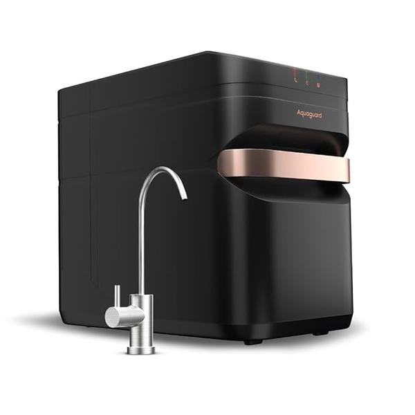 Engineered with dual purification technology (RO + UV), this Aquaguard purifier ensures every drop of water is 100% safe, pure, and mineral-balanced. Its compact design with under-sink installation makes it both stylish and space-saving, while the SS faucet adds durability and elegance.Specifications:Brand: AquaguardType: RO + UVInbuilt Tank Storage: 7 LitresPurification Capacity: 15 Litres/HourInstallation: Under SinkFaucet: Stainless Steel (SS)Maximum Duty Cycle: 40 Litres/DayPower: 40 VDCMode: Auto Cutoff – prevents overflow & saves energyAvailable Colour: BlackHighlights:✅ Advanced RO + UV purification for double protection✅ Compact 7L storage with 15L/hr purification rate✅ Under-sink model with premium SS faucet✅ Energy-efficient 40 VDC power system with auto cutoff✅ Sleek black design to complement modern kitchens
