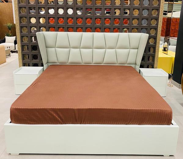 This in-house manufactured king size bed embodies elegance, comfort, and durability. Crafted with high-quality materials and a sturdy frame, it offers a luxurious sleeping experience while enhancing the bedroom’s aesthetic appeal. Its spacious 180x200 cm design provides unmatched comfort, making it the perfect blend of functionality and style. The refined finish and attention to detail highlight the craftsmanship of in-house production, ensuring this bed becomes the timeless centerpiece of any modern bedroom.
