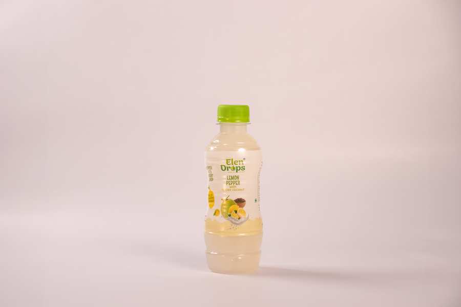 Step into a world of bold flavors with Elen Drops Lemon Pepper with Tender Coconut Flavor – a drink that’s as refreshing as a cool ocean breeze and as exciting as a burst of spice!We’ve taken the tangy freshness of ripe lemons, added the fiery, earthy kick of pepper, and then softened it all with the naturally sweet, velvety essence of tender coconut. The result? A perfectly balanced taste that teases your taste buds with citrusy zing, wakes them up with peppery warmth, and then soothes them with creamy coconut bliss.Every sip is a tropical escape, a refreshing indulgence that energizes your senses while keeping you cool and hydrated. Ideal for sunny days, post-workout refreshment, or simply when you crave something adventurous and unique.