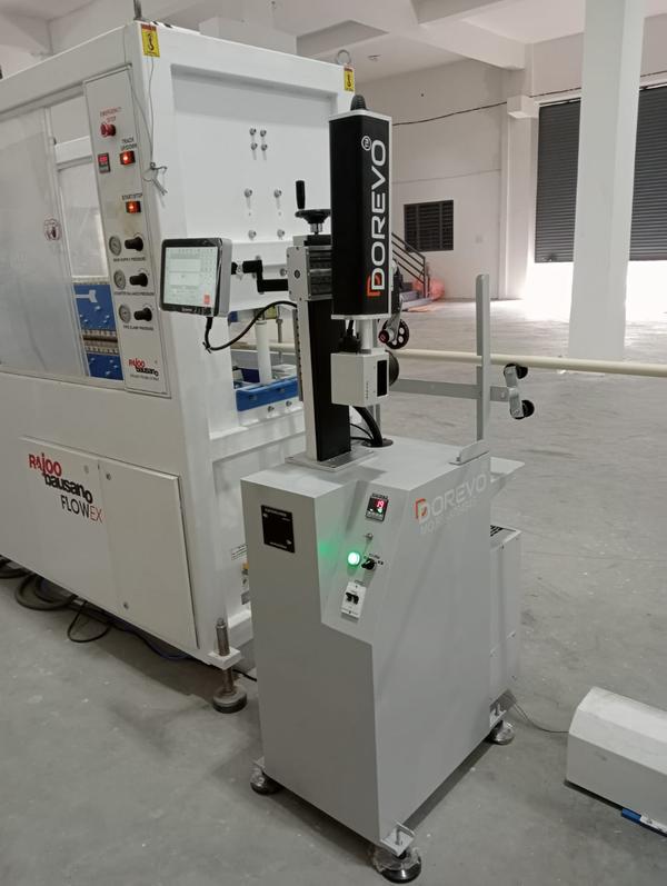 # Fiber Laser Fly Marking MachineHigh-speed, on-the-fly laser marking solution for continuous production lines. Delivers permanent, high-contrast marks on moving parts without stopping conveyors or indexing fixtures.OverviewThe Fiber Laser Fly Marking Machine synchronizes laser output with part motion using encoder feedback and optional vision alignment. Ideal for serial numbers, barcodes (QR/DM/GS1), logos, dates, and variable data on metals and many plastics—directly on the conveyor, chute, or rotary system.Key FeaturesOn-the-fly marking: Encoder-synced marking with motion compensation; no line stoppagePermanent, high-contrast marks: Fiber laser for metals, some engineered plasticsHigh speed: Maintains clarity at elevated line speeds with dynamic focus controlVariable data: Real-time serialization, timestamps, shift codes, UDI/traceabilityVision options: Mark verification and auto-correction (OCV/OCR, code grading)Integration-ready: PLC/SCADA/MES, Ethernet/IP, PROFINET, Modbus TCPLow operating cost: No inks/consumables; minimal maintenanceCompact head: Easy OEM integration on conveyors and packaging linesSafety-first: Class 1 enclosure options, interlocks, fume extraction ports