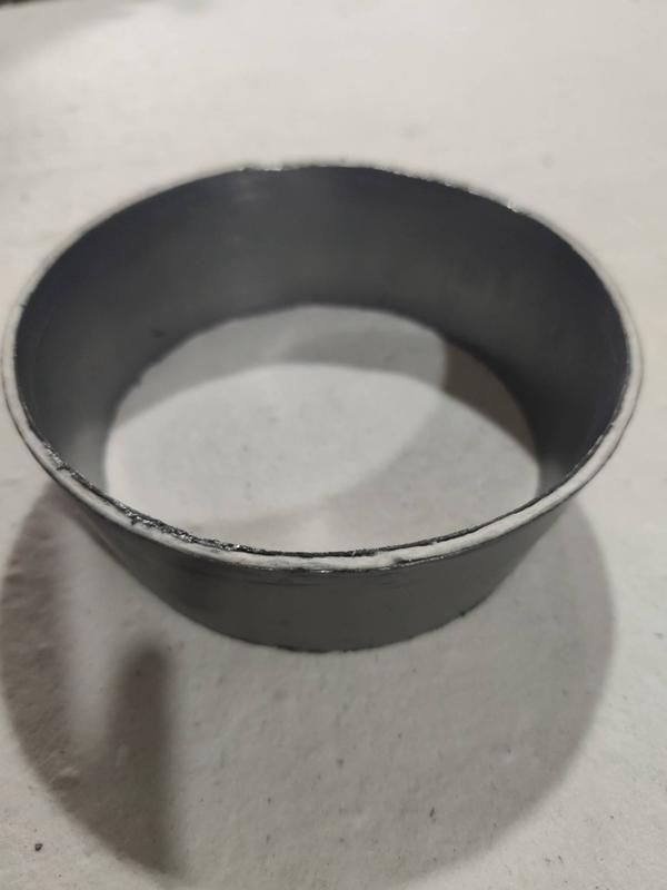 This Two-Side Graphite-Coated Ceramic Fiber Gasket is a premium refractory sealing solution designed for ladle shroud applications in steel and aluminium casting. Made from high-purity ceramic fiber and coated with graphite on both inner and outer surfaces, it offers superior thermal insulation, surface strength, and sealing efficiency under extreme temperatures up to 1260°C.The dual graphite coating enhances resistance to gas leakage, molten metal splash, and thermal shock, ensuring reliable and safe operation during continuous casting. Lightweight yet durable, these gaskets provide easy installation, long service life, and higher operational safety compared to standard ceramic fiber gaskets.At Kumaran Shapes and Gasket, we are proud to be one of the only manufacturers in India producing this unique two-side graphite-coated gasket, designed specifically for high-performance ladle shroud systems.✅ Key Features:Two-side graphite coating (inner & outer) for maximum sealingWithstands extreme temperatures up to 1260°CExcellent gas-tight performance & thermal shock resistanceProtects against molten metal splash and erosionLightweight, flexible, and easy to installCustom sizes available for ladle shroud applications