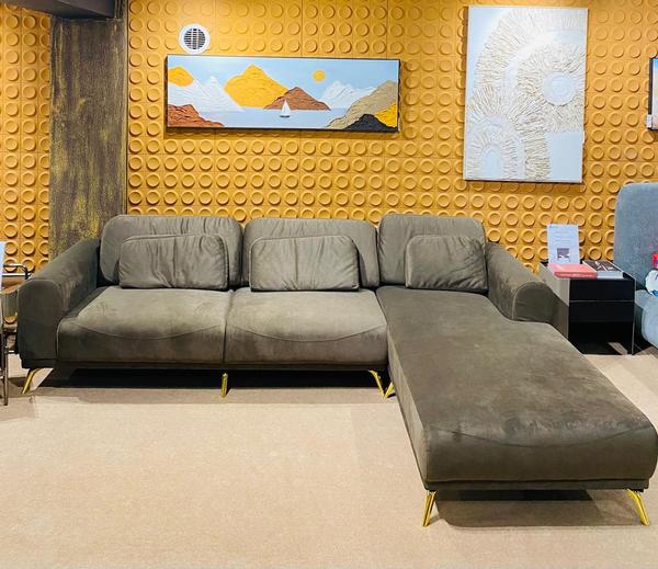 Experience the perfect blend of luxury and comfort with this L-shaped premium sofa. Designed with high-quality materials, it offers spacious seating that fits beautifully in modern living rooms while exuding elegance. The sleek design, soft cushioning, and premium finish make it a centerpiece that enhances both style and relaxation. Ideal for family gatherings or lounging, this imported sofa redefines comfort, making your home look more refined and welcoming.