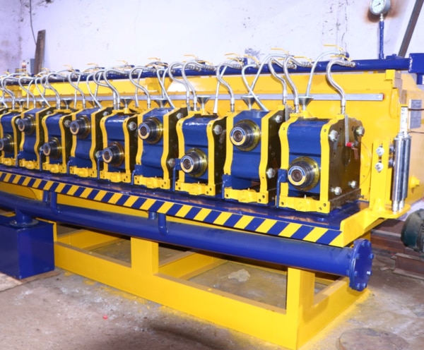 An Aluminium Conductor Rod Mill is a specialized industrial facility used to produce aluminium rods, primarily for electrical conductor applications. These rods serve as the raw material for manufacturing various types of electrical cables and overhead transmission lines. The process begins with high-purity aluminium ingots, typically 99.7% or higher in purity, which are melted in a furnace and cast into cast bar or directly into rod form through continuous casting and rolling systems.Modern aluminium rod mills utilize advanced Continuous Casting and Rolling (CCR) technology, which integrates casting and rolling in a streamlined process. In this method, molten aluminium is continuously cast into a bar, then passed through a series of rolling stands to reduce the diameter and improve the mechanical properties of the rod. This integrated approach ensures high production efficiency, consistent quality, and superior surface finish.The final aluminium rods produced usually have a diameter of 9.5 mm, though other sizes such as 12 mm or 15 mm may also be manufactured based on end-use requirements. These rods are characterized by excellent electrical conductivity, corrosion resistance, and flexibility, making them ideal for applications in power transmission and distribution networks.Rod mills are equipped with a number of quality control systems, including online diameter gauges, surface defect detectors, and automatic coiling machines to ensure uniformity and packaging standards. Additionally, modern mills prioritize energy efficiency and reduced environmental impact through advanced melting technologies and waste heat recovery systems.Key suppliers of aluminium rod mill technology include companies such as Southwire, Continuus-Properzi, and SMS Group. The demand for aluminium conductor rods continues to grow with the global push toward electrification, renewable energy infrastructure, and lightweight materials for energy efficiency. As a result, aluminium rod mills play a critical role in supporting the development of modern electrical and industrial infrastructure.