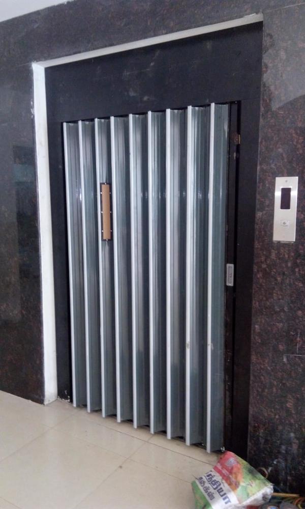 We are one of the most reliable companies in this domain and are into providing Goods Lift in Thrippunithura, Kerala, South India.Top Goods Lift Manufacturers in Thrippunithura KeralaSmall Goods Lift Manufacturers in Thrippunithura KeralaGoods Lift Manufacturers in Thrippunithura Kerala Contact NumberHydraulic Goods Lift Manufacturers in Thrippunithura KeralaBest Goods Lift Manufacturers in Thrippunithura KeralaGoods Lift Manufacturers in Thrippunithura Kerala AddressWe are interested to supply our Goods Lift to Changanassery, Mattanur, Punalur, Nilambur, Cherthala, Sultan, Bathery, Maradu, Kottakkal, Taliparamba, Shornur, Pandalam, Kattappana, Cherpulassery, Mukkam, Iritty, Valanchery, Varkala, Nileshwaram, Chavakkad, Kothamangalam, Pathanamthitta, Attingal  in Kerala, South India. Goods Lift – DescriptionA Goods Lift (also known as a freight elevator or material lift) is a mechanical device designed to transport heavy materials, goods, equipment, and products between different floors in a building or facility. Unlike passenger lifts, goods lifts are specifically engineered to handle large, bulky, or heavy loads, often with reinforced platforms, higher weight capacities, and safety mechanisms.They can be powered by electric motors, hydraulic systems, or traction mechanisms, depending on the usage requirements and load capacity. These lifts are commonly used in industrial, commercial, and storage environments.Applications of Goods LiftWarehouses and Storage FacilitiesTransporting heavy boxes, pallets, and stock between floors.Factories and Industrial UnitsMoving machinery parts, raw materials, or finished goods safely and efficiently.Retail and SupermarketsShifting goods from storage areas to display sections.HospitalsHandling supplies, equipment, and medical inventory without interfering with patient movement.Hotels and RestaurantsTransferring food supplies, linens, and kitchen equipment between service areas.Construction SitesLifting tools, cement bags, and construction materials to different levels.Logistics and Distribution CentersStreamlining the flow of goods and improving turnaround time for loading and unloading.Benefits of Goods LiftImproved EfficiencyReduces time and labor required to move goods manually between floors.Enhanced SafetyMinimizes risks associated with carrying heavy loads, preventing accidents and injuries.Increased Load CapacityCan handle large, bulky items that are difficult to transport by hand or via stairs.Space OptimizationMakes vertical transport easier, freeing up floor space for other operations.Durability and ReliabilityBuilt to handle industrial conditions, making them robust and long-lasting.Cost-EffectiveReduces operational costs by lowering manpower requirements and improving productivity.Customizable DesignCan be tailored to meet specific load, space, and environmental requirements.Smooth OperationsHydraulic and electric lifts ensure steady and vibration-free transportation of goods.Hydraulic Goods LiftOperates using hydraulic cylinders powered by oil pressure.Suitable for low-rise buildings (usually up to 5 or 6 floors).Offers smooth operation and high load-bearing capacity.Requires less space for machinery compared to traction lifts.Traction Goods LiftUses steel ropes and counterweights to lift the platform.Powered by electric motors.Suitable for medium to high-rise buildings.Offers faster speeds and higher efficiency.Chain Hoist Goods LiftUses chain mechanisms along with pulleys for lifting.Suitable for handling moderate loads.Compact design, commonly used in workshops or smaller industries.Rack and Pinion Goods LiftUses a gear system for vertical movement.Known for safety and stability, especially in environments where sway and tilt must be minimized.Often used in heavy-duty industrial settings.Pneumatic Goods LiftPowered by compressed air systems.Suitable for lightweight loads.Requires less maintenance and is ideal where hydraulic systems are not feasible.Vertical Reciprocating Conveyor (VRC)A type of goods lift designed specifically for repetitive transport of materials.Often used in manufacturing plants, retail centers, and warehouses.Custom or Modular Goods LiftDesigned according to specific industrial or architectural needs.Can include features like automated doors, remote controls, or explosion-proof materials depending on the environment.Choosing the Right TypeLoad Capacity: Heavy loads – hydraulic or traction lifts; lighter loads – pneumatic or chain hoist.Building Height: Low floors – hydraulic; high floors – traction.Space Constraints: Hydraulic systems need less headroom; traction systems need more.Maintenance & Budget: Pneumatic lifts have simpler maintenance, while traction lifts offer efficiency at higher costs.Safety Features of Goods LiftsOverload ProtectionPrevents operation when the load exceeds the maximum capacity.Protects the lift from damage and ensures user safety.Emergency Stop ButtonAllows the operator to halt the lift immediately in case of emergencies.Safety InterlocksEnsures that doors or gates cannot be opened unless the lift is at the correct level.Limit SwitchesStops the lift at predefined points to avoid over-travel or mechanical failure.Brake SystemsAutomatic brakes engage during power failure or emergency, preventing the lift from falling.Alarm SystemsAlerts operators if there is a malfunction or irregularity during operation.Non-Slip FlooringEnsures goods stay in place during transportation and reduces the risk of accidents.Protective EnclosuresPrevents access to moving parts and reduces the chances of injury.Fire Safety MeasuresSome lifts are equipped with fire-resistant panels and emergency ventilation systems.Backup Power SupplyAllows the lift to be operated temporarily during power outages.Maintenance Tips for Goods LiftsRegular InspectionsCheck the mechanical parts, wiring, and hydraulic systems at regular intervals.LubricationKeep moving parts well-lubricated to reduce wear and tear and prevent overheating.Test Safety SystemsPeriodically test the overload sensors, brakes, and limit switches to ensure they function properly.CleanlinessKeep the lift clean and free from dust, debris, or oil that may affect its performance.Monitor Load PatternsAvoid sudden heavy loads or uneven weight distribution to prevent strain on the lift.Professional ServicingHire certified technicians for periodic servicing and repairs.Check Hydraulic Fluids or Pneumatic SystemsEnsure fluid levels and air pressure are within recommended levels for efficient operation.Keep RecordsMaintain logs of inspections, repairs, and maintenance for accountability and troubleshooting.Training for OperatorsTrain personnel to operate the lift safely and respond to emergencies correctly.Replace Worn PartsPromptly replace damaged cables, chains, seals, or brakes to avoid breakdowns.