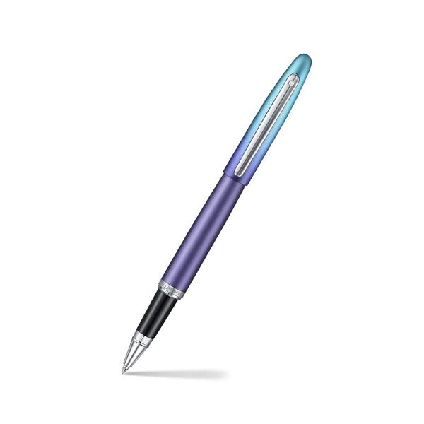 Sheaffer VFM 9430 Expressions Blue and Purple Pearlised Gradient Rollerball Pen with Chrome-Plated TrimsThe Sheaffer VFM Expression Rollerball in Blue & Purple Pearlised Gradient isn’t just eye-catching, it’s a reflection of individuality in motion. Designed for those who move with confidence and write without filters, it brings together vibrant aesthetics and Sheaffer’s trusted smoothness. From journaling your truth to signing what matters, this pen is made for moments that express who you are.Pearlised gradient finish with chrome-plated trimsModern, tapered silhouetteSnap-on mechanismSmooth ink flow for a refined writeComes in a responsibly recycled, FSC-certified premium gift box with curated thematic visualsPearlised Gradient FinishChrome-plated Trims
