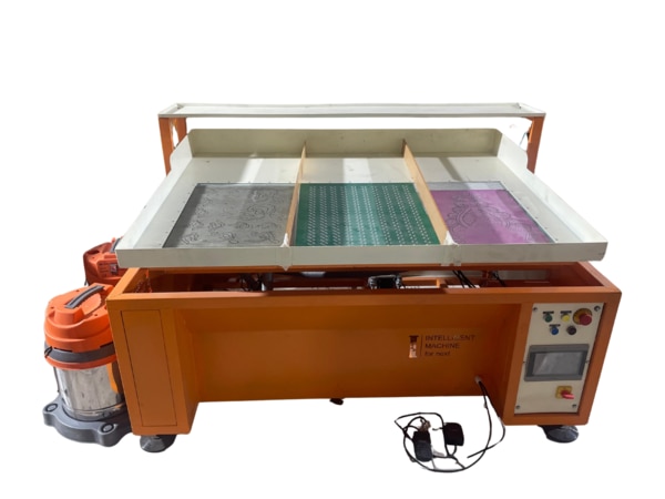 The Jarkan Sticker Making Machine by INTELLIGENT MACHINE is a high-performance solution for producing rhinestone and decorative stone sticker sheets used in textile, fashion, and garment industries to produce “Jarkan” stone stickers / rhinestone sheets / decorative stone‑work. It automates the stone setting process, saving time and labor while delivering precise results.