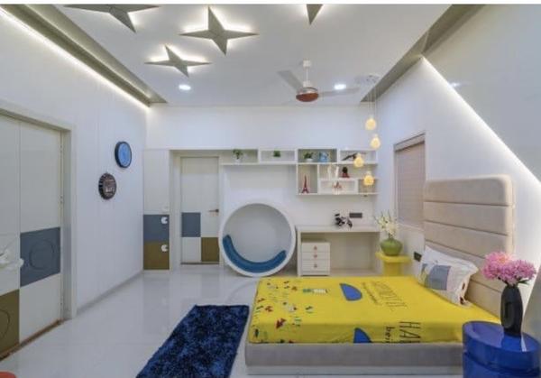 ➣ Design kids bedrooms that are both creative and functional, catering to children of all ages.➣ Our interiors combine playful elements with practical layouts for a balanced environment.➣ Age-appropriate furniture and décor ensure comfort, safety, and long-term usability.➣ Smart storage solutions keep toys, books, and essentials organized without cluttering the space.➣ Study corners and learning zones are integrated seamlessly into the bedroom design.➣ Vibrant colors and engaging themes spark imagination and creativity in every child.➣ Premium materials and finishes provide durability while maintaining a stylish appearance.➣ Flexible designs adapt as your child grows, ensuring interiors remain relevant over time.➣ Options are available for both mid-range and premium preferences, accommodating all families.➣ Our expert team delivers timeless kids bedroom interiors that blend aesthetics, comfort, and functionality.📞 Contact Numbers: 9655006069 / 9655006409🌐 Website: www.smarthomeindia.comService Coverage:We serve our interior design services all over Tamil Nadu.In Chennai, we provide kids bedroom interiors across all major localities.In Tamil Nadu, our services cover Coimbatore, Madurai, Trichy, Salem, Erode, Tirunelveli, Vellore, and other key cities.