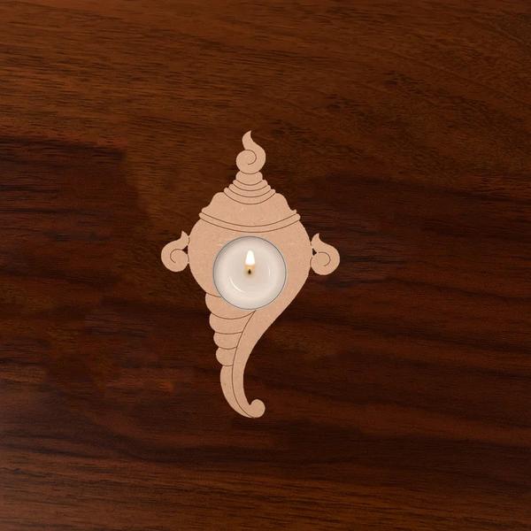 SHANKH SHAPED MDF T-LIGHT HOLDER SET OF 2Decor With MDF Shankh (Conch) T-Light Candle Holder, symbolizing purity, positivity, and prosperity. Crafted from durable MDF with a unique conch-inspired design, it’s perfect for pooja rituals, festivals, weddings, or simply creating a serene ambiance at home.