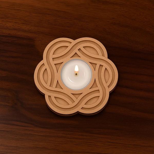 GEOMETRIC FLOWER SHAPED MDF T-LIGHT HOLDER SET OF 2Add elegance to your festive décor with this Geometric MDF Tea Light Holder, expertly crafted for both traditional celebrations and modern interiors. Designed with intricate laser-cut patterns, this DIY wooden base is perfect for Diwali, Navratri, weddings, pooja, and art projects.Its minimalist geometric design makes it a versatile décor piece — ideal for artists, teachers, homemakers, and kids. Use it as a centerpiece, a diya holder, or paint it to match your personal style. Whether you're lighting up your space or gifting something handmade, this tea light base is a timeless addition to any home.Made from high-quality 4 mm MDF, it blends modern design with traditional Indian aesthetics—perfect for spiritual setups, gifting, or DIY décor projects.
