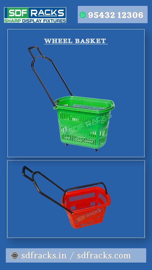 A shopping basket with wheels is typically referred to as a shopping trolley or rolling shopping cart. There are several variations of this item, including those used in supermarkets and smaller, personal-use versions. Supermarket trolley: A large, wire or plastic cart with four wheels, provided by stores for customers to use while shopping.Rolling basket: A smaller, handheld plastic basket with an extendable handle and wheels, which can be wheeled or carried. These are available in many retail stores as a smaller alternative to a full-sized cart.