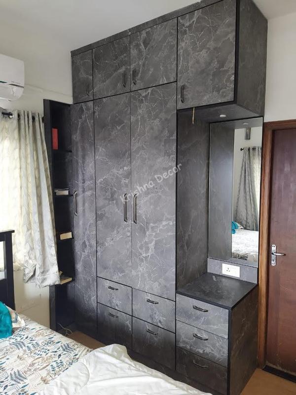 Coimbatore Bedroom Wardrobe Shutters With GlassWe also take a all kind of interior job work orders in Coimbatore and nearby districts. For More DetailsKrishna Decor+91 90420 68977.