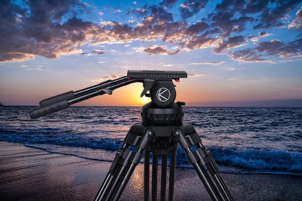 EN35G-AL Professional Video TripodHeavy-Duty Stability. Precision Control. Built for the Demanding Professional.The EN35G-AL Tripod System is engineered for high-end broadcast and film production, delivering exceptional stability and precision for heavy camera rigs. With a massive payload capacity of 35 kg, it’s designed to support professional cinema cameras, studio configurations, and teleprompter setups with absolute confidence.Key Features🎥 High Payload CapacitySupports up to 35 kg, making it ideal for large cameras, teleprompters, and full broadcast rigs.⚙️ Smooth Pan, Drag & Counterbalance ControlFeatures 8-step variable Pan & Drag settings for fluid, professional camera movements.8-step Counterbalance ensures perfect weight compensation for effortless tilt control and stability.🔘 Precision Head with 150 mm Ball BaseThe 150 mm fluid head design allows fast leveling and smooth motion — essential for dynamic studio and field work.🦵 Durable Aluminium Legs (24 mm)Crafted from high-grade 24 mm aluminium tubing, offering superior strength, lightweight handling, and long-term reliability even in demanding environments.🧳 Built for ProfessionalsIdeal for ENG, EFP, broadcast studios, and on-location shoots.Combines rugged construction with refined motion control for perfect balance between performance and durability.Specifications at a GlanceFeature	SpecificationPayload Capacity	: 35 kgCounterbalance : 1 – 8 StepsPan & Drag Control : 1 – 8 StepsBall Size	: 150 mmLeg Type : AluminiumTube Diameter	: 24 mm