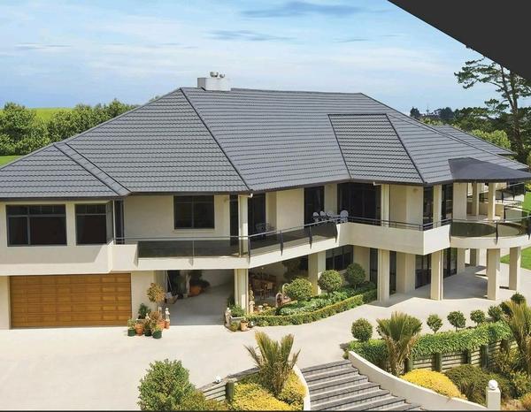 Transform your roof with our high-performance shingles - where durability meets style.