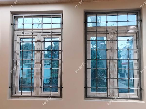 M-CRAFT(Avadi,Chennai)Ornaments Window Grill with MRF PU paint finishingWindow Grills in Tamil Nadu – Secure and Stylish ProtectionM-CRAFT in Tamil Nadu manufactures durable and aesthetically pleasing window grills for homes, offices, and commercial spaces. Our window grills offer enhanced security without compromising on design, featuring customized patterns in MS, GI, and SS materials.Our designs range from simple, modern styles to intricate ornamental patterns, catering to both traditional and contemporary architecture. Powder-coated finishes and weather-resistant treatments ensure long-lasting durability. Whether for safety or decorative purposes, our expert team crafts high-quality window grills that enhance the beauty and security of your property.Secure your windows with custom-designed grills. Contact M-CRAFT in Tamil Nadu today!