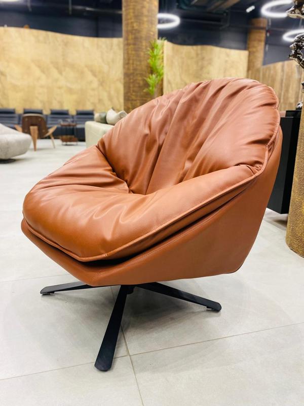 Indulge in superior comfort with this imported leisure chair, designed to bring elegance and relaxation to your space. Its plush seating, soft curves, and refined finish make it a perfect addition to any modern home. Ideal for lounges or reading corners, this chair offers the perfect blend of luxury and coziness. Crafted for ultimate relaxation, it redefines seating comfort with timeless imported craftsmanship.