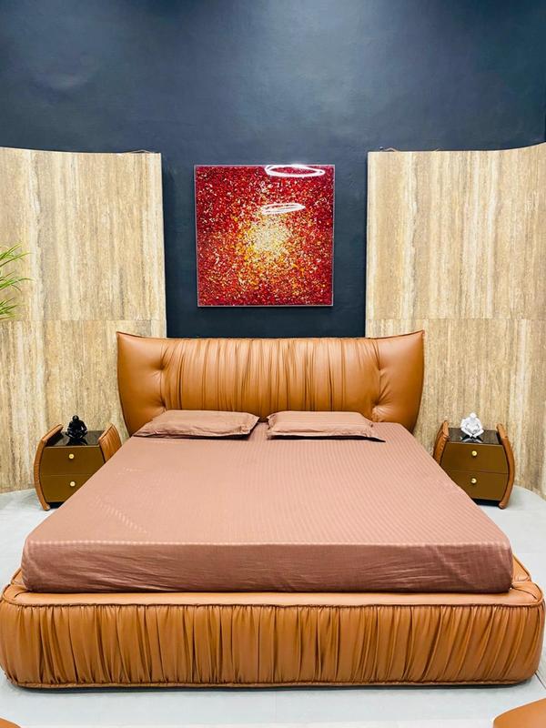 Experience the essence of luxury with this in-house manufactured master bed, crafted to deliver both comfort and elegance. Designed with precision and style, this bed can be customized in size, material, and design to match your personal taste. Its premium build and sophisticated finish add a touch of grandeur to any bedroom, making it the centerpiece of restful indulgence and timeless interior aesthetics.