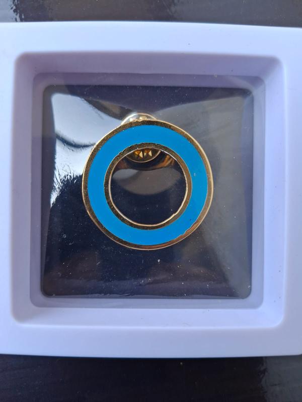 Brass etched lapel pin 
the Diabetes Ring 