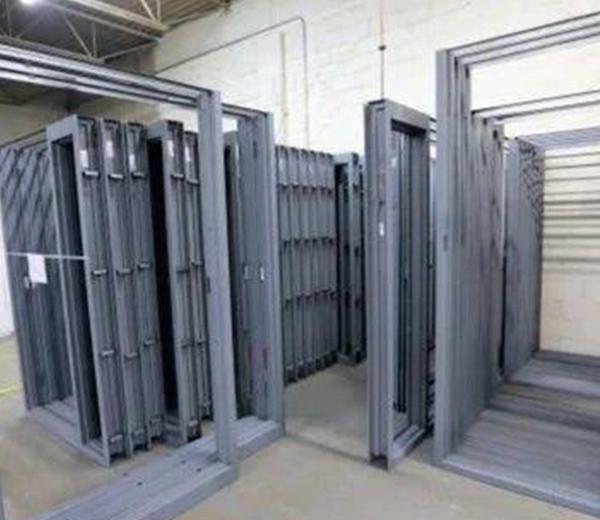 In French door construction, “L-section” and “Z-section” generally refer to specific profile shapes of the structural Galvanized Iron (GI) or steel components used for framing and reinforcement. These materials are chosen for their strength, durability, and resistance to rust and weather conditions. L-Section Material DescriptionMaterial: Typically Galvanized Iron (GI) or steel, often with a powder-coated finish for added protection.Shape: A right-angle profile, resembling the letter “L”.Function: Primarily used for framing or reinforcing corners and edges of the door frame or panels, providing a solid, clean edge.Properties: Offers strength, stability, and helps maintain the structural integrity of the frame, especially at joints. Z-Section Material DescriptionMaterial: Also commonly Galvanized Iron (GI) or steel, available in various gauges (thicknesses).Shape: A profile that resembles the letter “Z”.Function: Used in door frames or panels where additional rigidity or stability is required, or to fit specific design needs. In some industrial applications, “Z” blade type louvers are also used in steel doors for air flow control.Properties: Provides significant structural support and can be used for creating door frames that require enhanced strength and rigidity. 
