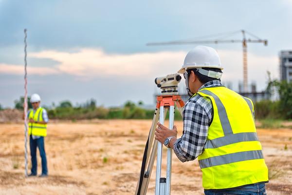 A topography survey is a detailed survey that maps the physical features and elevations of a piece of land to create a three-dimensional map. It identifies natural and man-made features like slopes, water bodies, vegetation, roads, and buildings, and is crucial for planning construction, infrastructure, and land use.