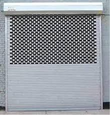 Rolling Grill Shutters: Secure, Stylish, and Durable Solutions
Gandhi Automation's rolling grill shutters offer the perfect combination of security, visibility, and ventilation. Ideal for various applications, including commercial, residential, industrial, retail, shops, showrooms, and shopping malls, these shutter grills seamlessly integrate with any building's architecture and interior space. Designed for strength and durability, they enhance the appearance of any property while ensuring maximum protection. As the leading manufacturer of grill shutter doors in India, we provide customized solutions tailored to your specific needs.
Key Features:
Made from Heavy Steel Bars: Constructed using heavy solid steel bars, our rolling grills offer exceptional strength and durability.
Available Shapes: Choose from rectangular and honeycomb shapes to suit your aesthetic and functional preferences.
Optimal Protection: Our grill shutter doors provide excellent protection without compromising visibility, air circulation, or light infiltration.
Low Maintenance: Designed for minimal maintenance, our rolling grill shutters are easy to clean and require less upkeep, saving you time and money.
CE Certified Automation: All automation for our rolling shutters and grills is CE certified and manufactured according to standards EN 13241-1: 2003+A1: 2011, and directives 2006/42/EC and 2004/108/EC, with an optional IS 6248 certification.
Enhanced Corrosion Resistance: Our shutter grills are protected by paint, hot-dip galvanizing, and stainless-steel materials, preventing rust and ensuring longevity, especially in coastal and high-humidity areas.
Why Choose Gandhi Automations' Rolling Grill Shutter?
At Gandhi Automations, we offer the best grill rolling shutters that combine security, style, and durability at competitive grill rolling shutter prices. Whether you're looking for a sliding grill shutter, automatic grill rolling shutter, or a rolling shutter with grill for balconies, we have the perfect solution. Our rolling grill gates are ideal for commercial spaces, showrooms, and residential use, ensuring maximum protection and aesthetic appeal.